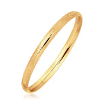 14K Yellow Gold Dome Style Children's Bangle with Diamond Cuts